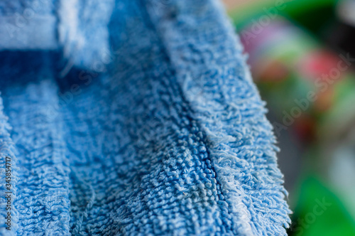 Blue fabric close-up, macro shot. Moisture-absorbing fabric. © Влад Варшавский