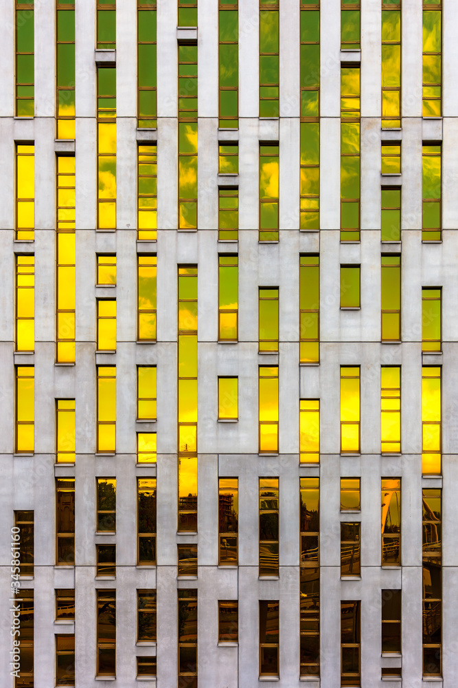 Postmodern Facade With Sky Reflections