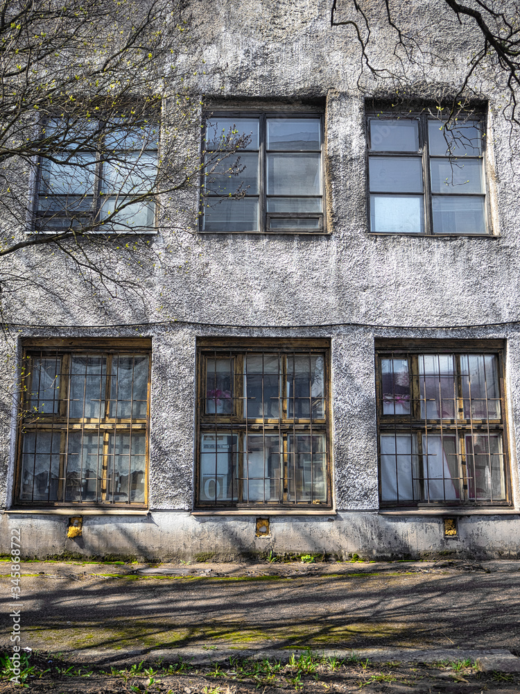 Naklejka premium Old soviet facade with some vintage windows