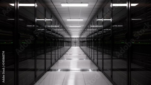 Digital information flows through network and data servers behind mesh panels in a server room of a data center or ISP. Network and data servers behind glass panels in a server room of a data center 