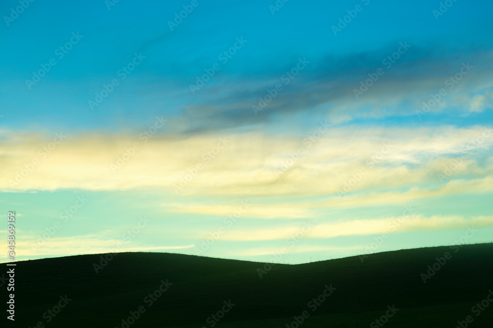 Sunset and sunrise sky background and silhouette of hills Sunset and sunrise sky background and silhouette of hills