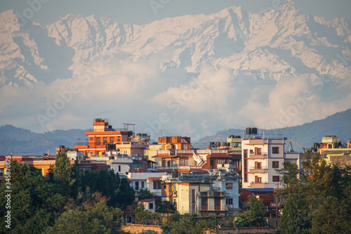 Cityscape with the Himalayan Mountains in the background