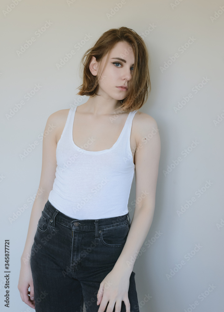 Portrait of a beautiful young woman with blue eyes. Portrait of a beautiful young woman with blue eyes.