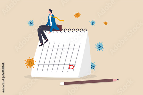 Coronavirus COVID-19 quarantine schedule calendar, plan for reopen business after COVID-19 lockdown concept, businessman business owner sitting on desktop calendar thinking about plan after lockdown.