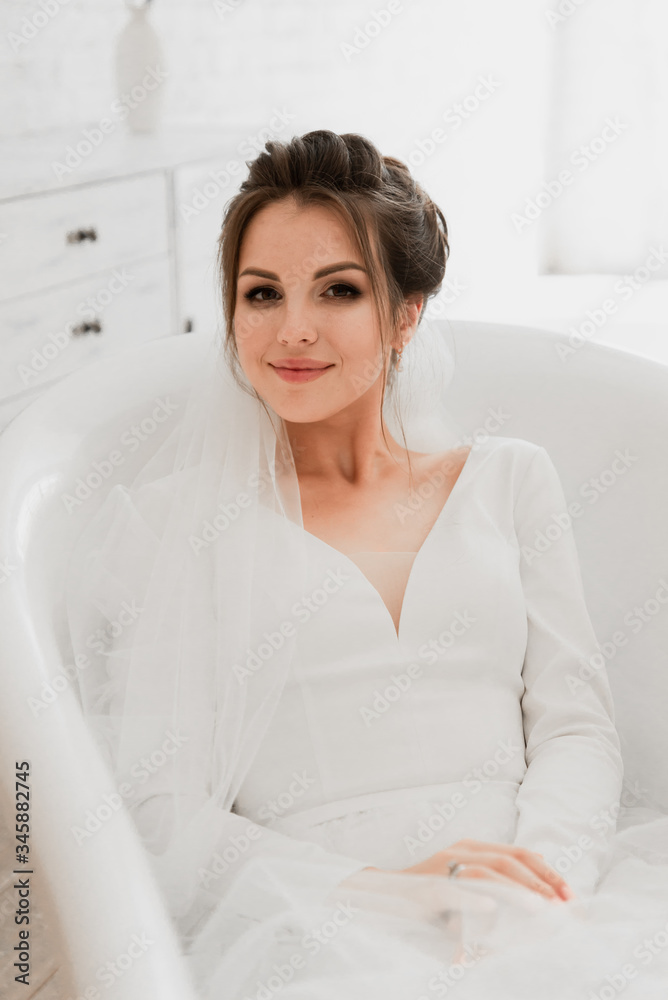 young bride lies in the bathroom,wedding day bride,beautiful girl in a wedding dress lies in a white bath,bride portrait,wedding photo shoot,Wedding Dress,bride touches face with hands young bride lies in the bathroom,wedding day bride,beautiful girl in a wedding dress lies in a white bath,bride portrait,wedding photo shoot,Wedding Dress,bride touches face with hands