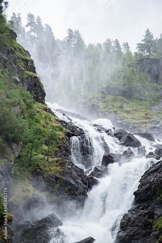 View on Cascade of L  tefossen waterfalls  one of the biggest waterfalls in Norway  Odda 