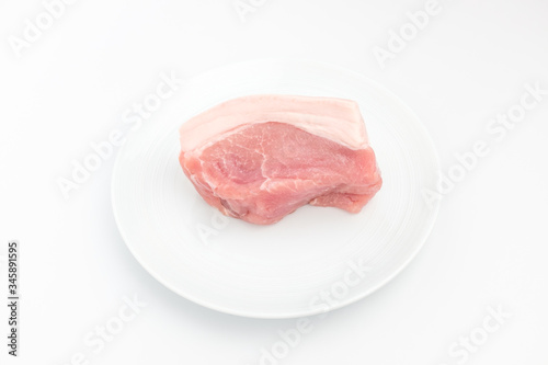 Cuadro en lienzo Pork hind leg on white background