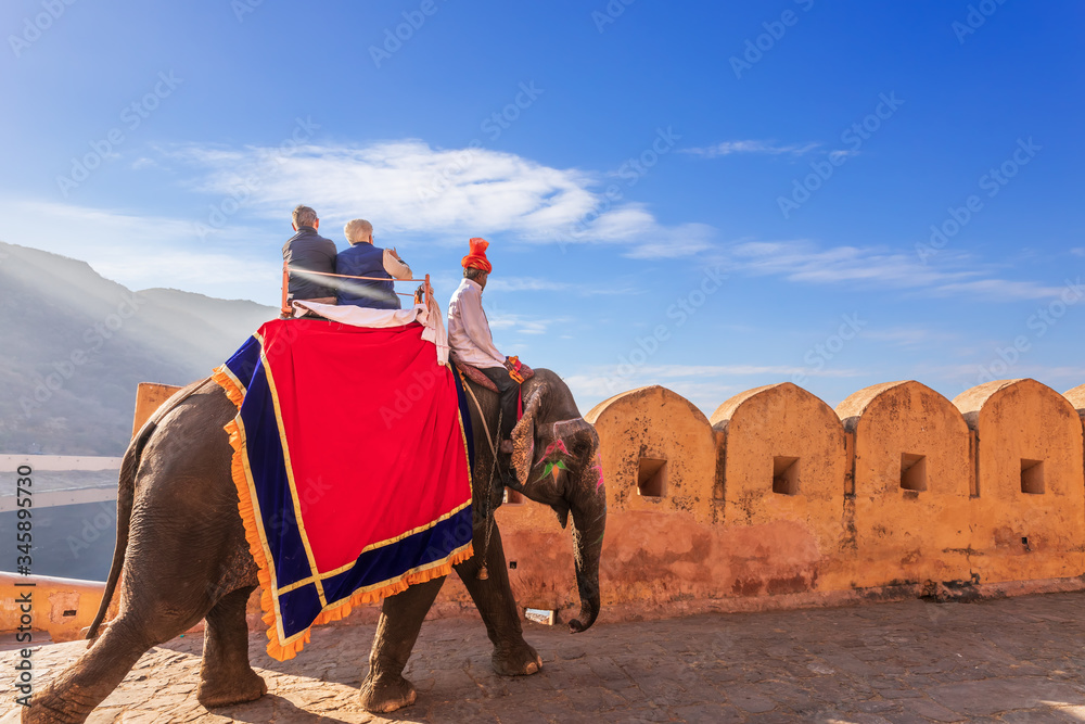 Riding on elephats, famous tourist attraction in Amber Fort of Jaipur, India