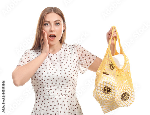 Troubled woman with heap of...