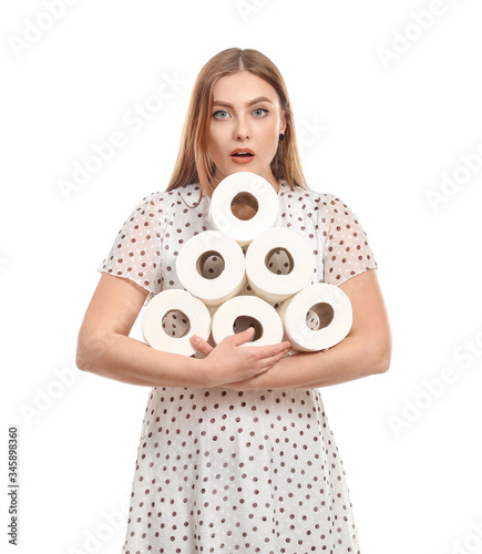 Troubled woman with heap of...