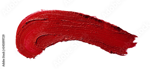 Glossy red lipstick stain swatch isolated on white background photo