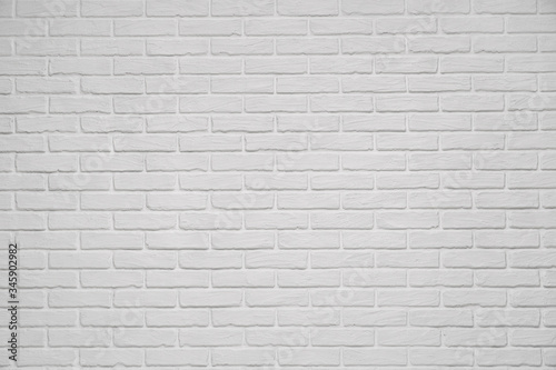 A white indoor brick wall abstract background or texture  new and clean  studio shoot