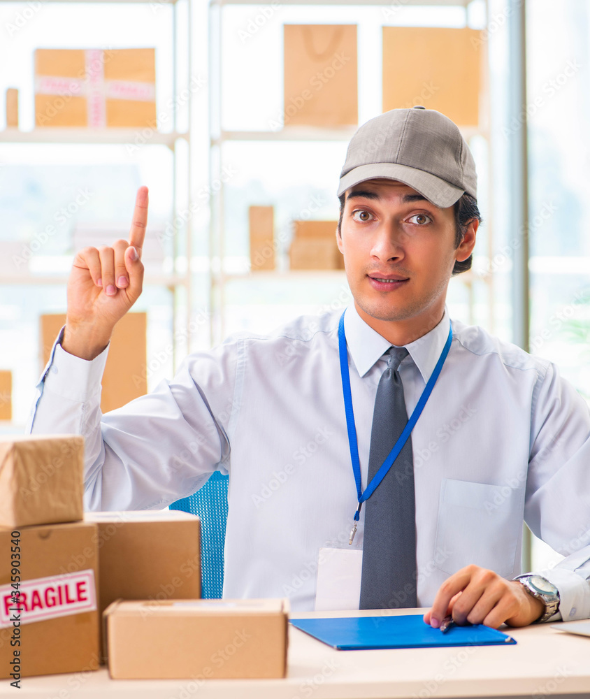 Male employee working in box delivery relocation service Male employee working in box delivery relocation service