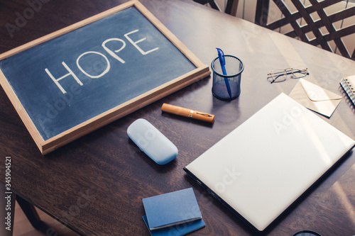 Business concept. Hope. Office table. Book. Pen. 
