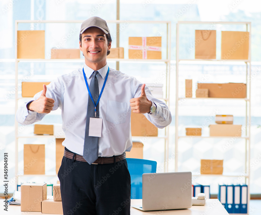 Male employee working in box delivery relocation service Male employee working in box delivery relocation service