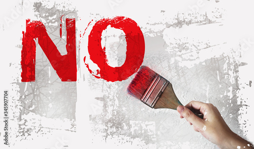 No word in red and paintbrush on white grey background. Refuce tolerance concept photo