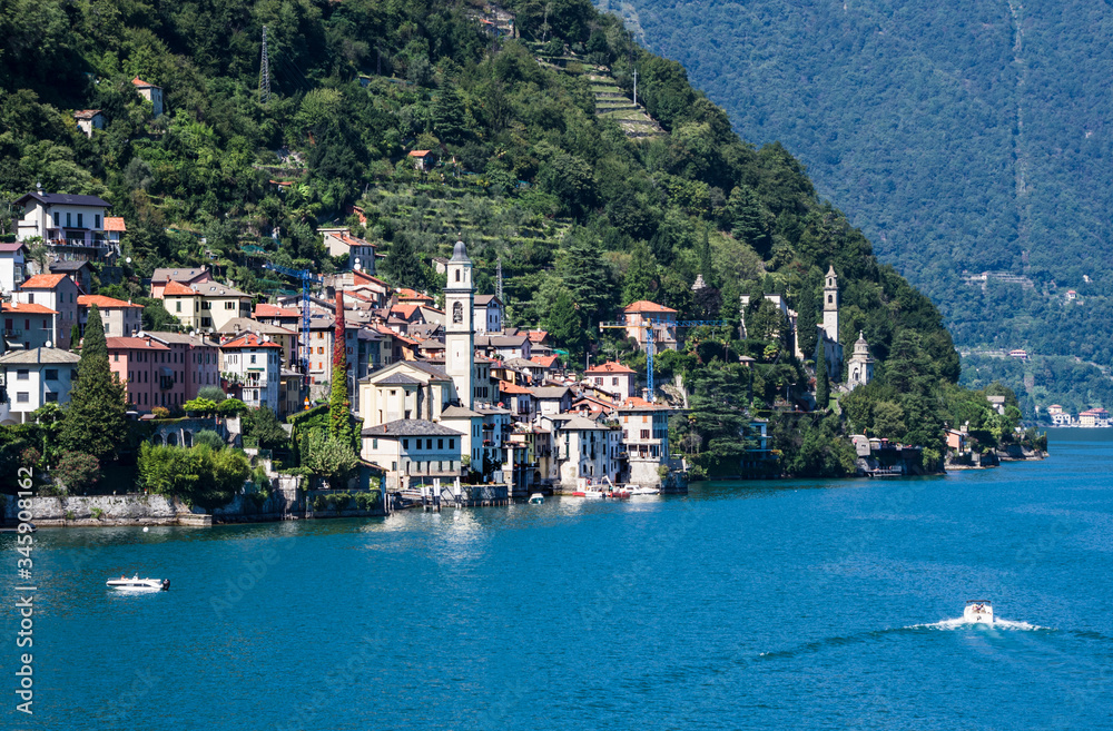 panoramic viewpoint over Como lake and an ancient fishing village.Italy