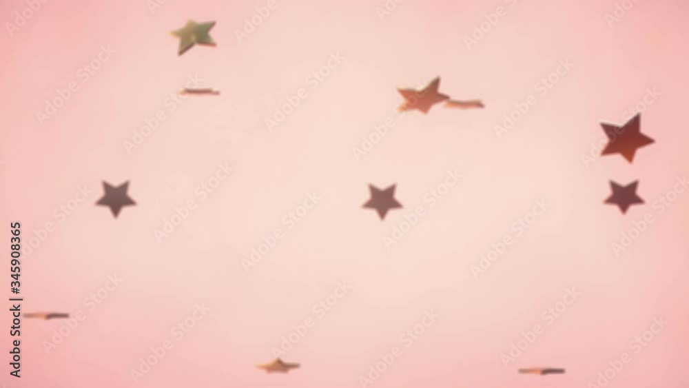 3d animation: Abstract looped background with lots of falling and rotating golden stars on pink-peach background. Holiday and party moving wallpapper.
3d animation: Abstract looped background with lots of falling and rotating golden stars on pink-peach background. Holiday and party moving wallpapper.