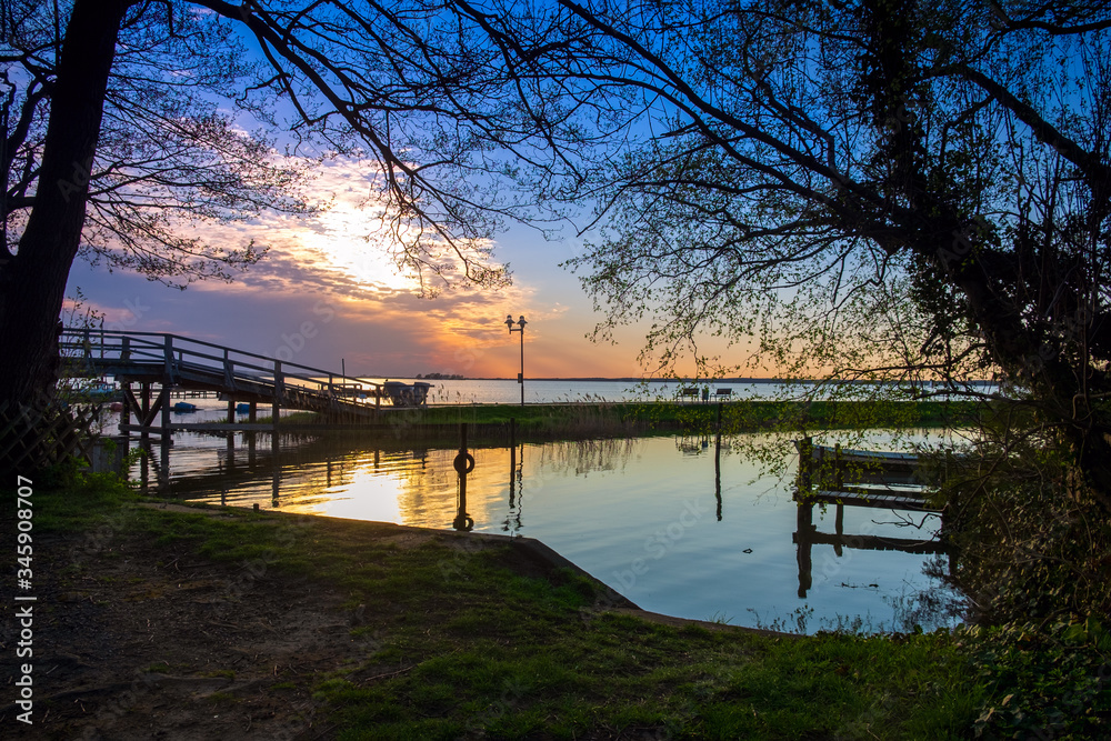 Beautiful romantic sunset over a calm lake