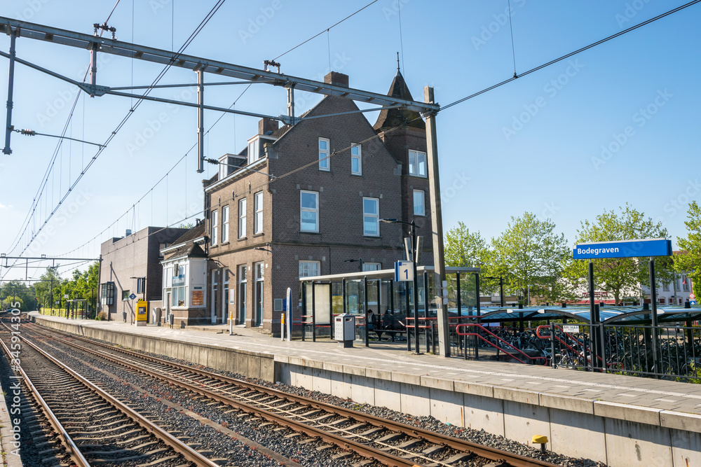 Fototapeta premium Scenic railway station of the small town of Bodegraven, close to the city of Gouda, Netherlands.