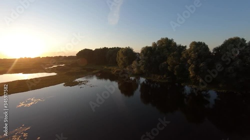 Feast of Ivana bathed, flight over the river at sunset photo