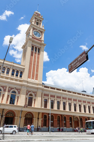 Luz Station in San Paulo.  View from Parque da Luz.  Building with a tower in front of Blue sky. Brazil.