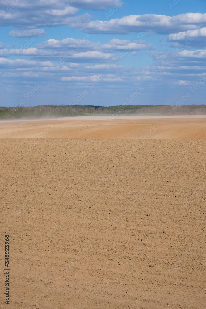 Dust storm in the field in Ukraine. Weathering of the soil. Dust storm in the field in Ukraine. Weathering of the soil.