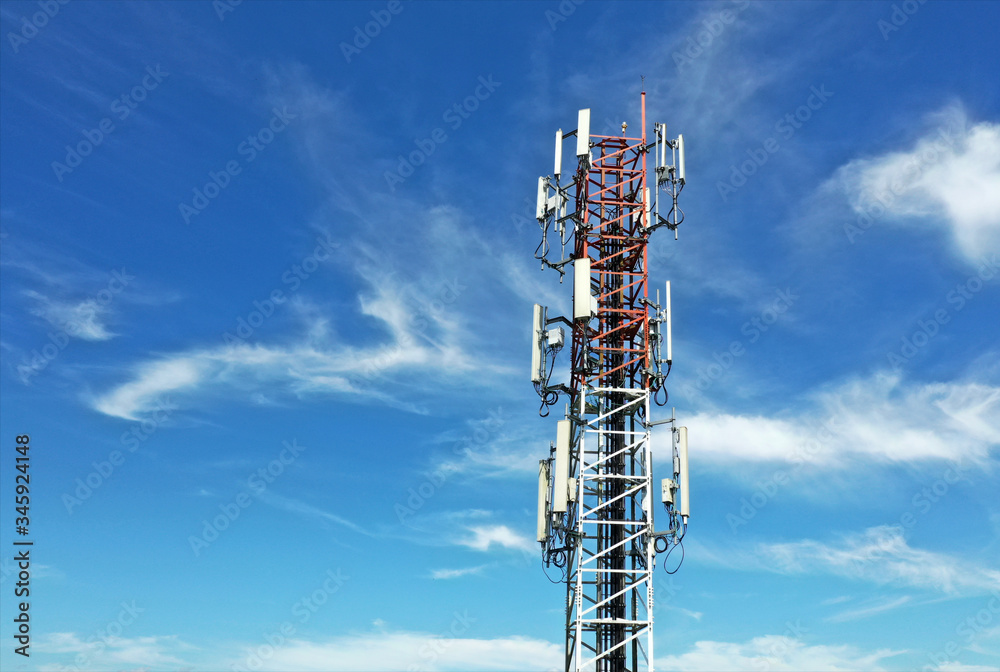 mobile telecommunication cell tower on Sky and clouds background mobile telecommunication cell tower on Sky and clouds background