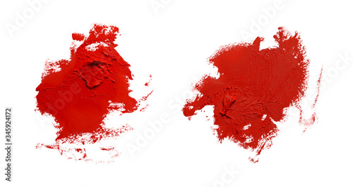 cosmetics lipstick or concealer smears on isolated white background
