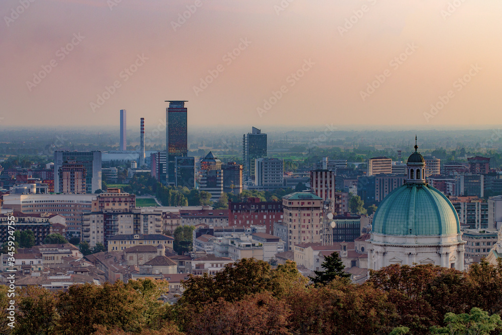 Aerial view of the city of Brescia at sunset