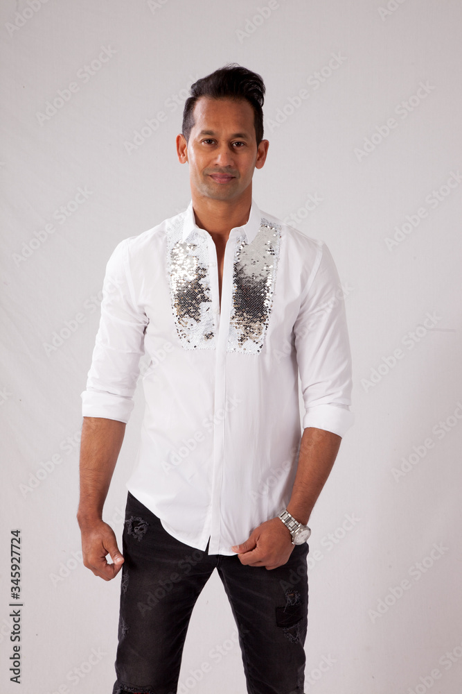 Fototapeta premium Happy man in a white shirt and a smile