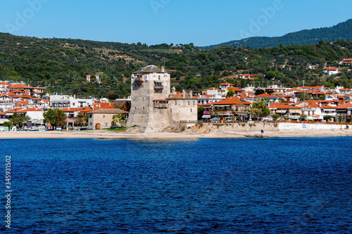 Historic fort in port and city Ouranoupolis , entry site to monasteries of Mount Athos, Chalkidiki, Greece photo