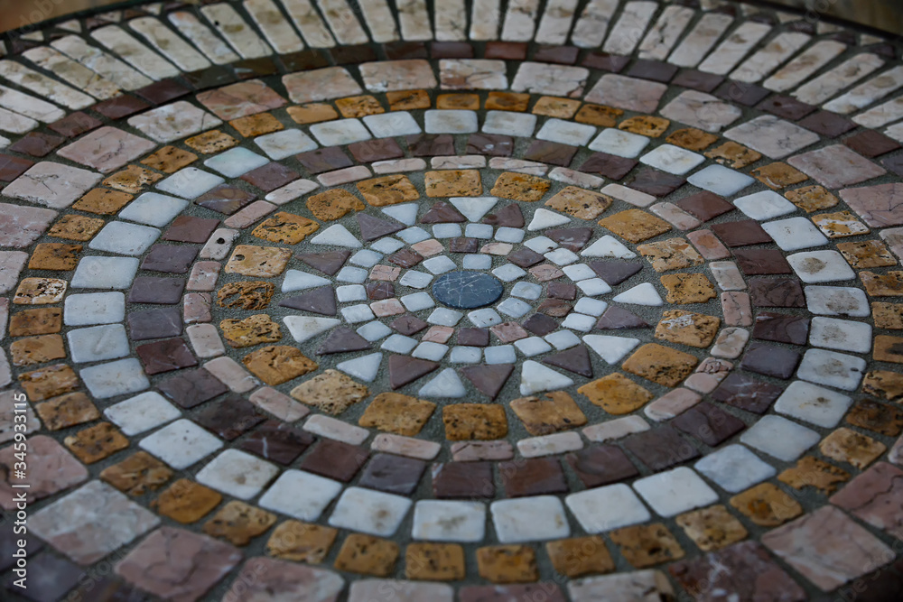 Muslim round stone ornament on the floor in the countryside