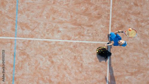 Aerial tennis serve.