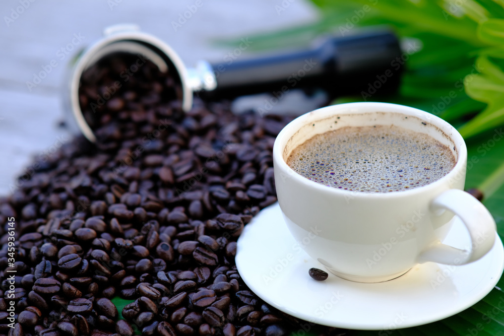 Fototapeta premium cup of coffee with beans