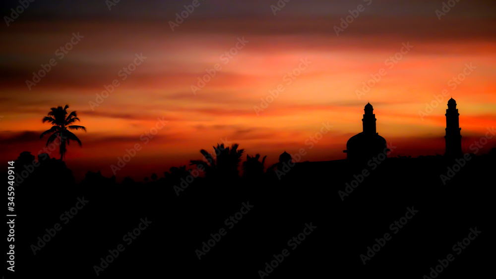 silhouette of mosque at sunset