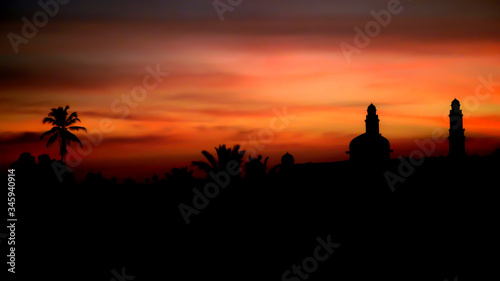 silhouette of mosque at sunset