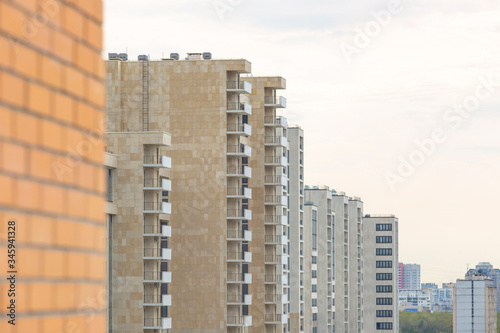 View of modern multi-story reinforced concrete houses 
