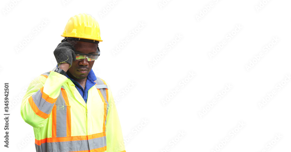 Close up of An African American handsome black engineer he is working in container box yard area Close up of An African American handsome black engineer he is working in container box yard area