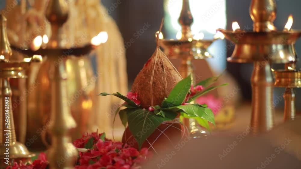 Traditional south Indian brass oil lamp 'Nilavilakku '. During events like housewarming, marriage etc., the Nilavilakku is lighted before starting the rituals. This video is taken during a wedding