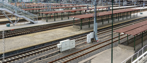 Platforms with rail tracks. Empty Train Station.