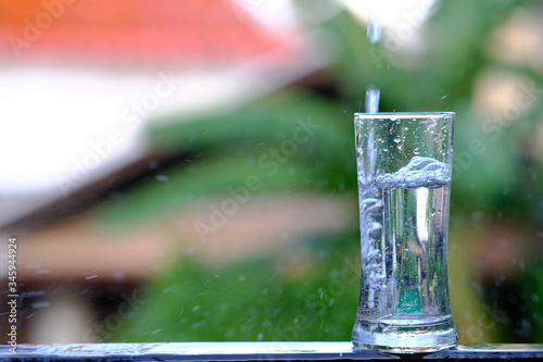 glass of water on green background © WS Studio 1985