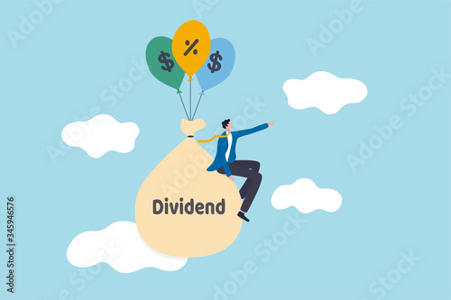 Dividend Stock investment return in financial crisis COVID-19 Coronavirus crash concept, happy businessman stock investor sitting on money bag with the word dividend floating with dollar sign balloons