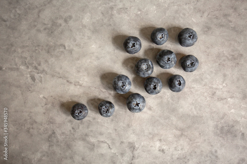 Scattered blueberries on counter
