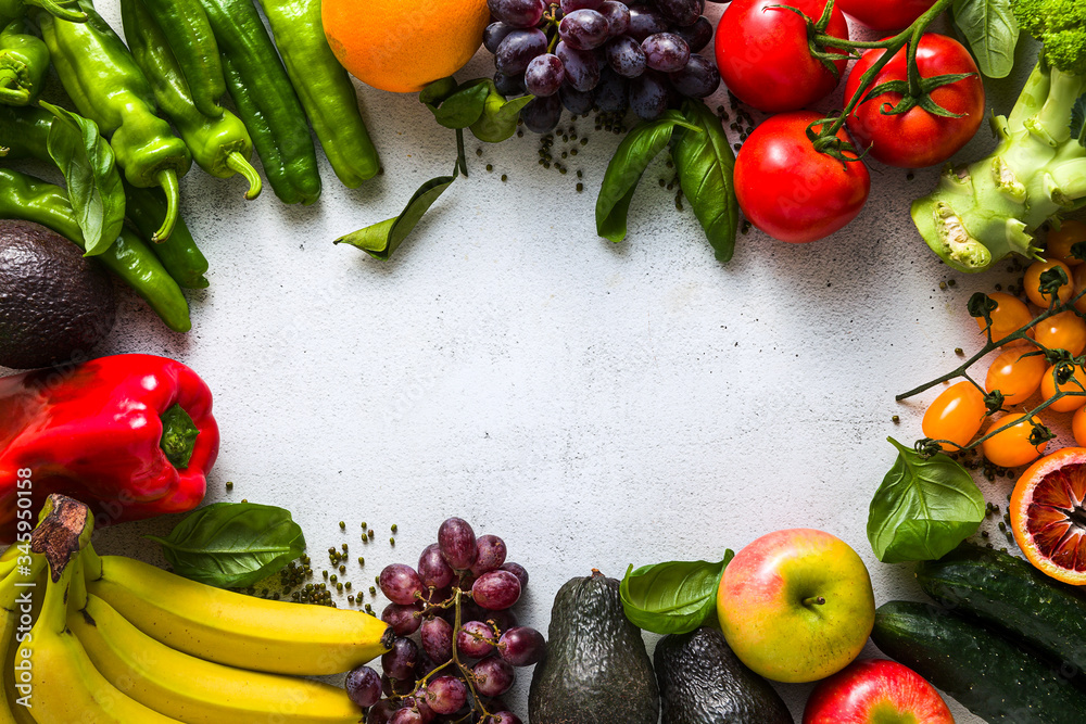 Fresh vegetables and fruits on a white kitchen table. Background for supermarkets, fresh food stores, delivery.