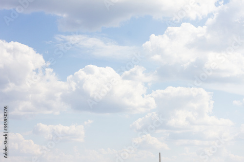 blue sky with lots of clouds. natural clean background with copy space © Евгений Гончаров