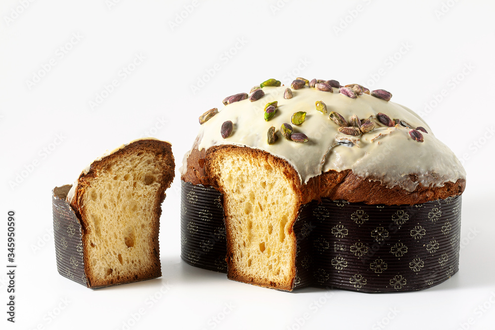 Easter festive sweet italian Bread Colomba with pistachio cream isolated on white Easter festive sweet italian Bread Colomba with pistachio cream isolated on white