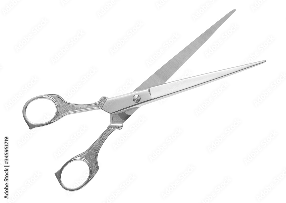 Silver metal scissors on a white background. Silver metal scissors on a white background.