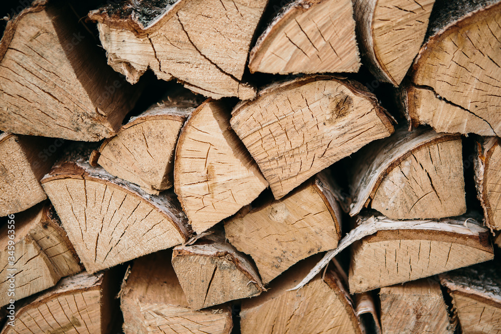 Texture of firewood. Background. Group of wooden logs Texture of firewood. Background. Group of wooden logs