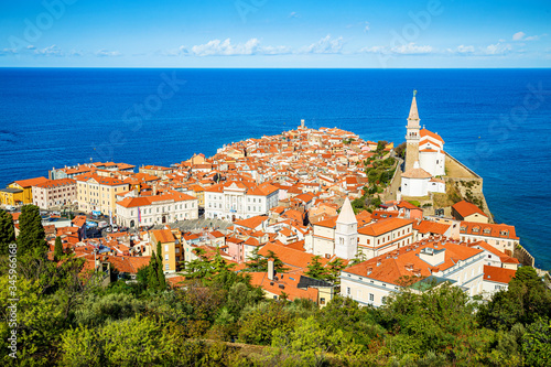 Historic city of Piran with Mediterranean Sea on a beautiful day photo